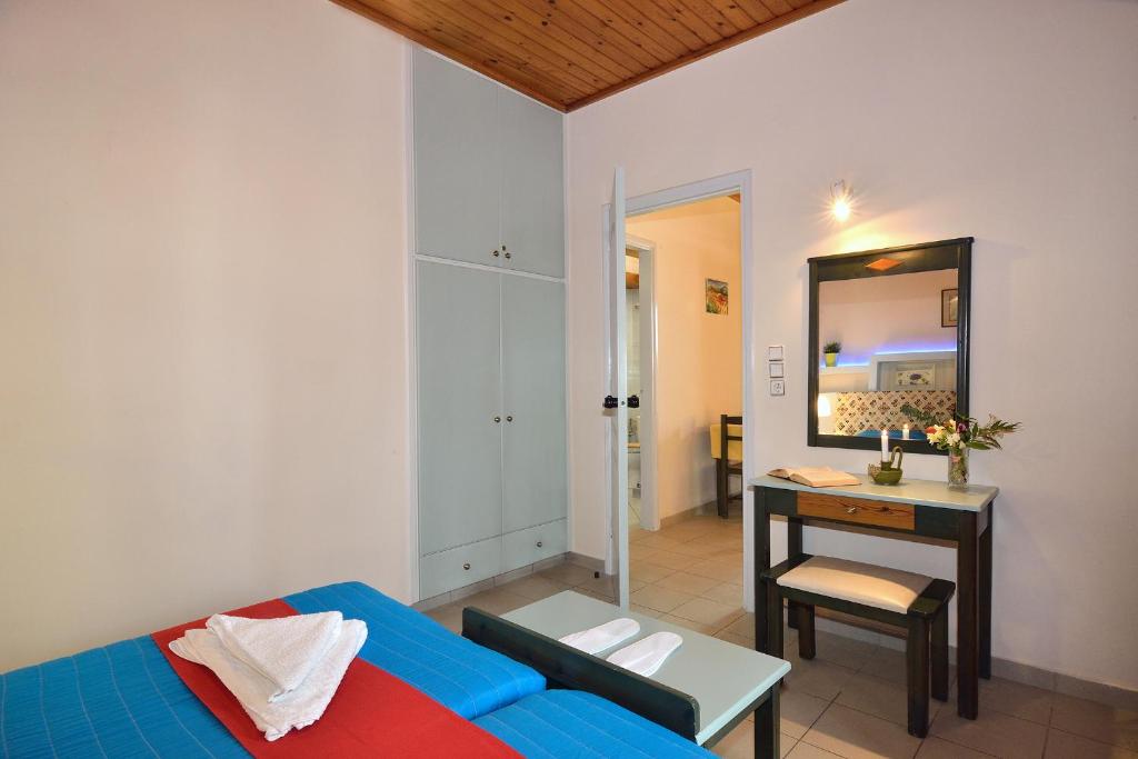 Postel nebo postele na pokoji v ubytování Mythos- Platanias- Hotel -Apts