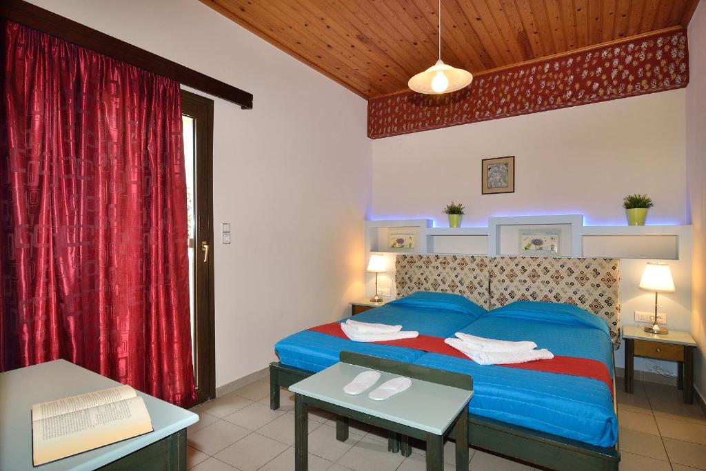 Postel nebo postele na pokoji v ubytování Mythos- Platanias- Hotel -Apts