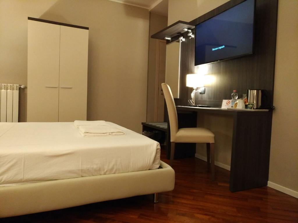 Posteľ alebo postele v izbe v ubytovaní Brain Rooms & Suite