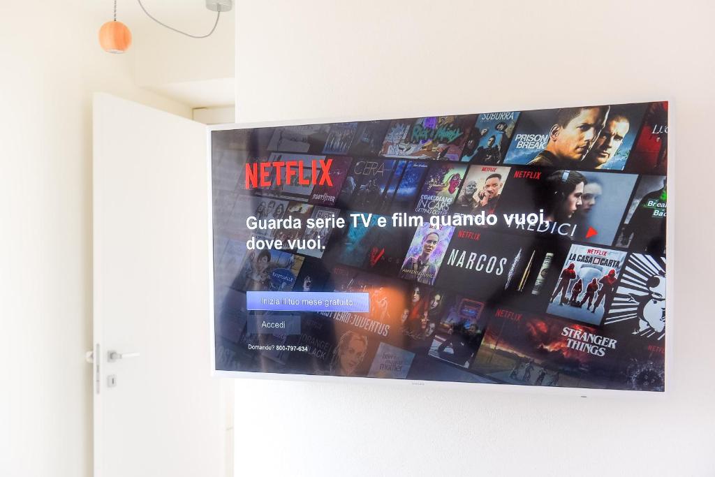 TV a/nebo společenská místnost v ubytování Ül Laghèe Blevio Apartments
