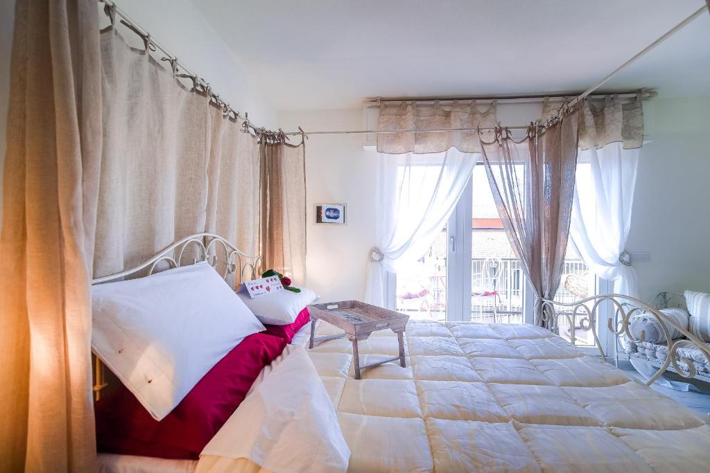 Postel nebo postele na pokoji v ubytování Ül Laghèe Blevio Apartments