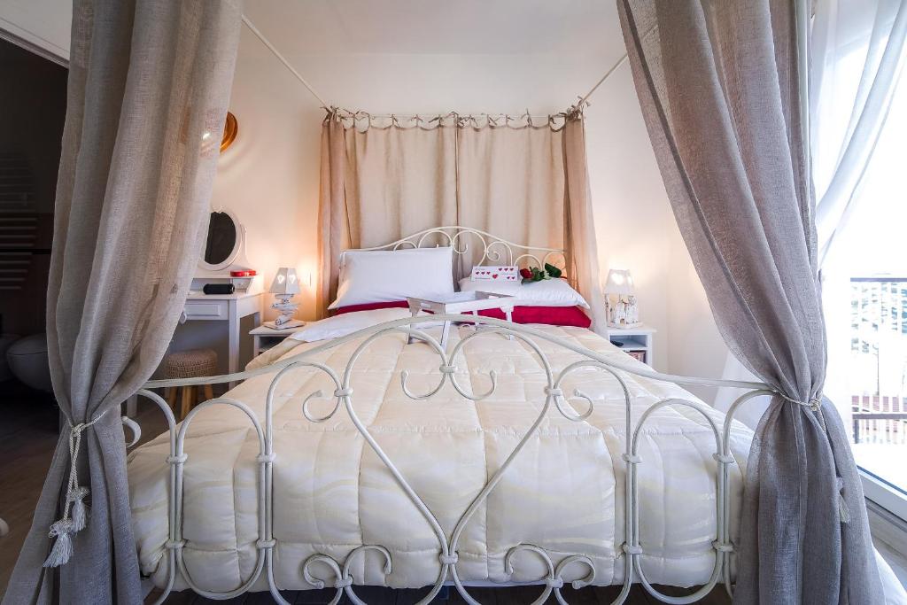 Postel nebo postele na pokoji v ubytování Ül Laghèe Blevio Apartments