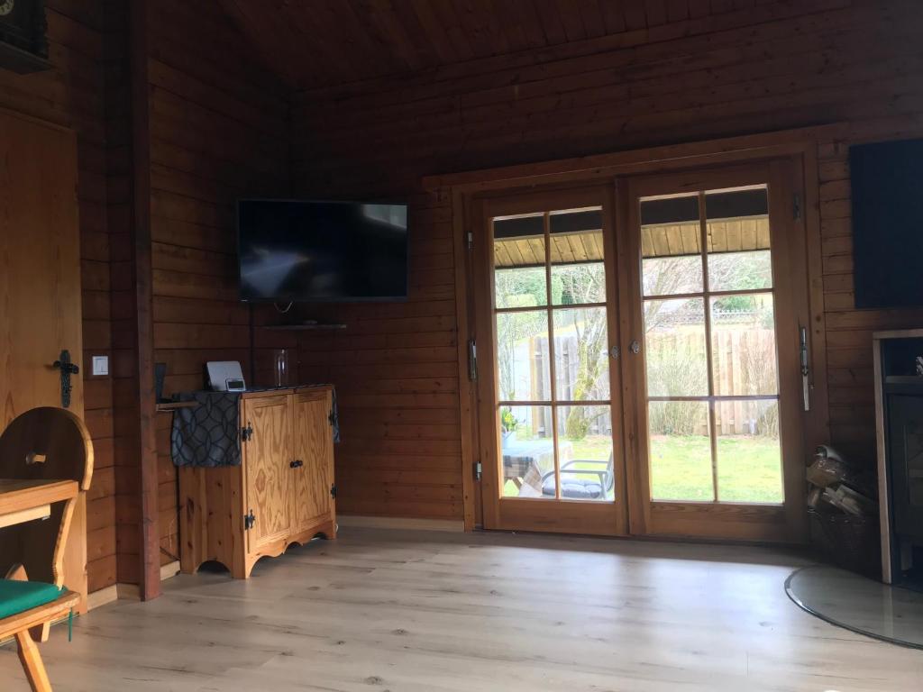 TV a/nebo společenská místnost v ubytování Ferienhaus Sauerland