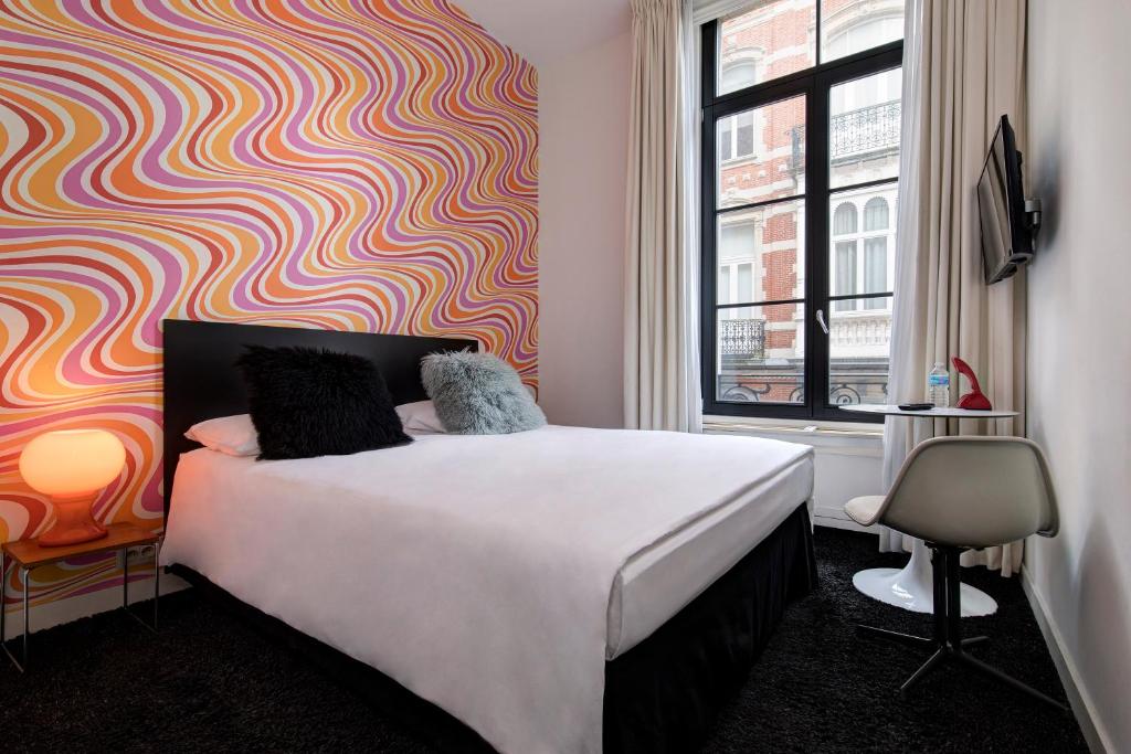 Postel nebo postele na pokoji v ubytování Vintage Hotel Brussels