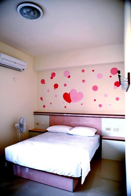 Postel nebo postele na pokoji v ubytování Caibei Homestay