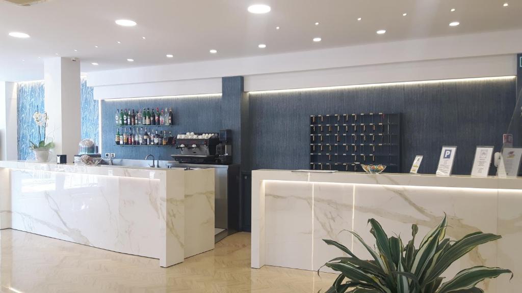 Nápoje v ubytování Hotel Grifone