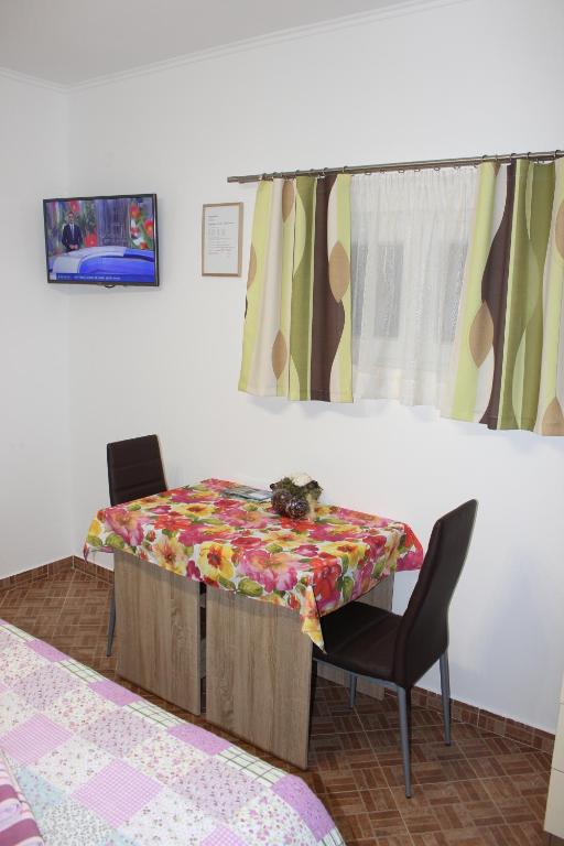 TV a/nebo společenská místnost v ubytování Rooms Katarina
