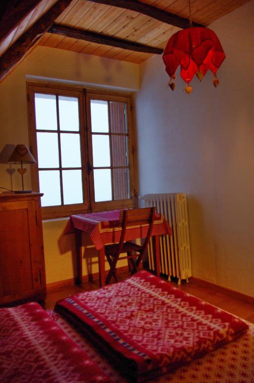 Postel nebo postele na pokoji v ubytování Gite Auberge La Soulan - gite de montagne