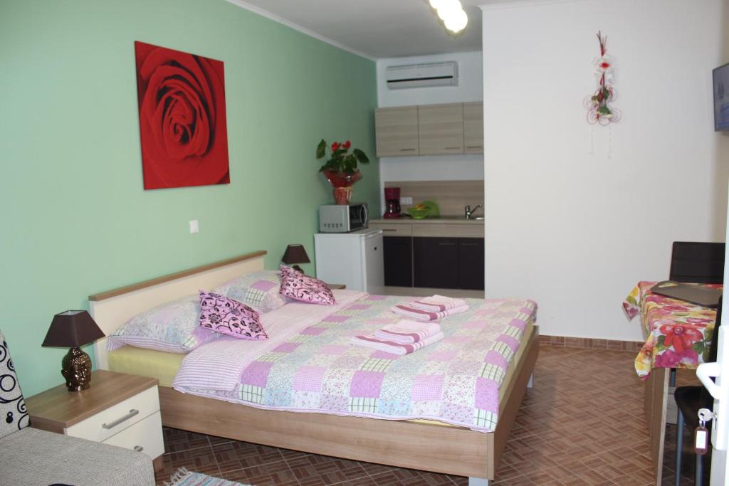 Postel nebo postele na pokoji v ubytování Rooms Katarina