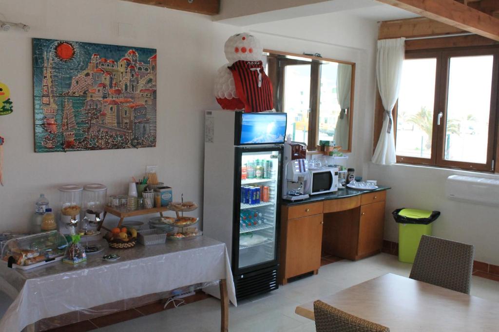 Kuchyň nebo kuchyňský kout v ubytování B&B Palazzo Manfredi Vieste, Fronte mare con Parcheggio