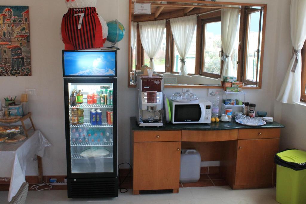 Kuchyň nebo kuchyňský kout v ubytování B&B Palazzo Manfredi Vieste, Fronte mare con Parcheggio