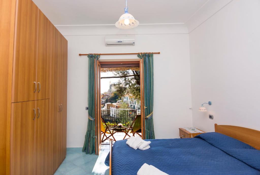 Postel nebo postele na pokoji v ubytování Le Nereidi B&B