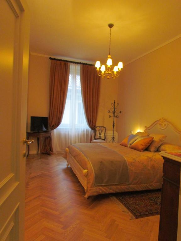 Postel nebo postele na pokoji v ubytování L'Approdo di Sant'Agostino
