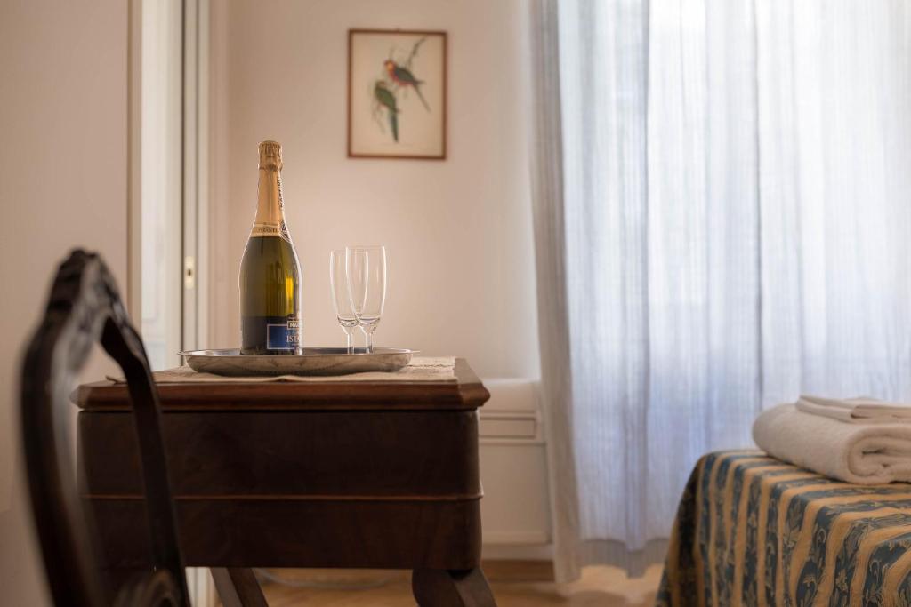 Posteľ alebo postele v izbe v ubytovaní Santa Felicita Apartments
