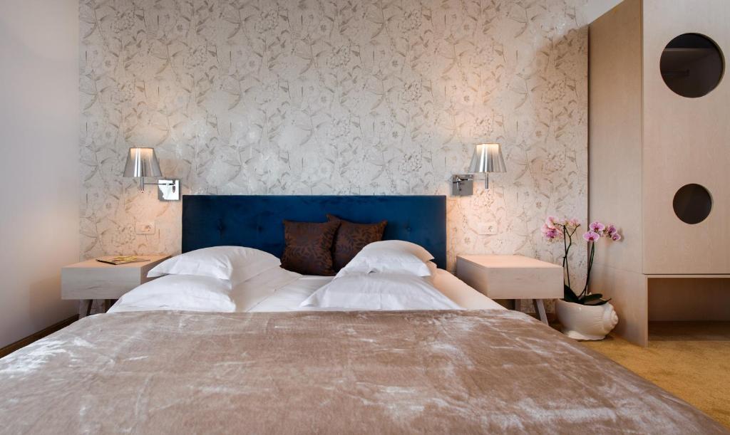 Posteľ alebo postele v izbe v ubytovaní Boban Luxury Suites