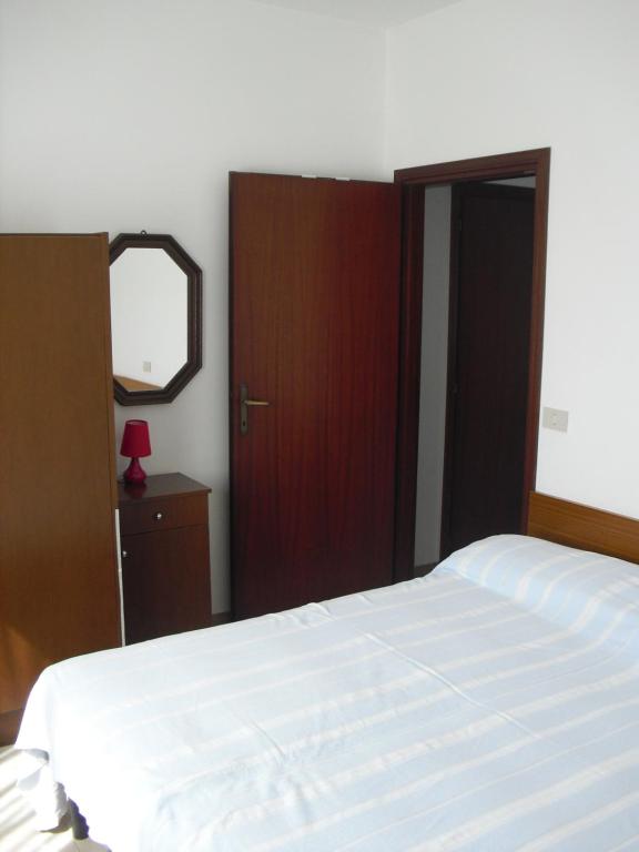 A bed or beds in a room at Casa Armanda
