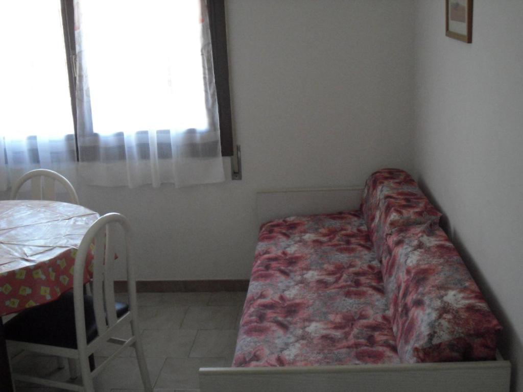 A bed or beds in a room at Casa Armanda
