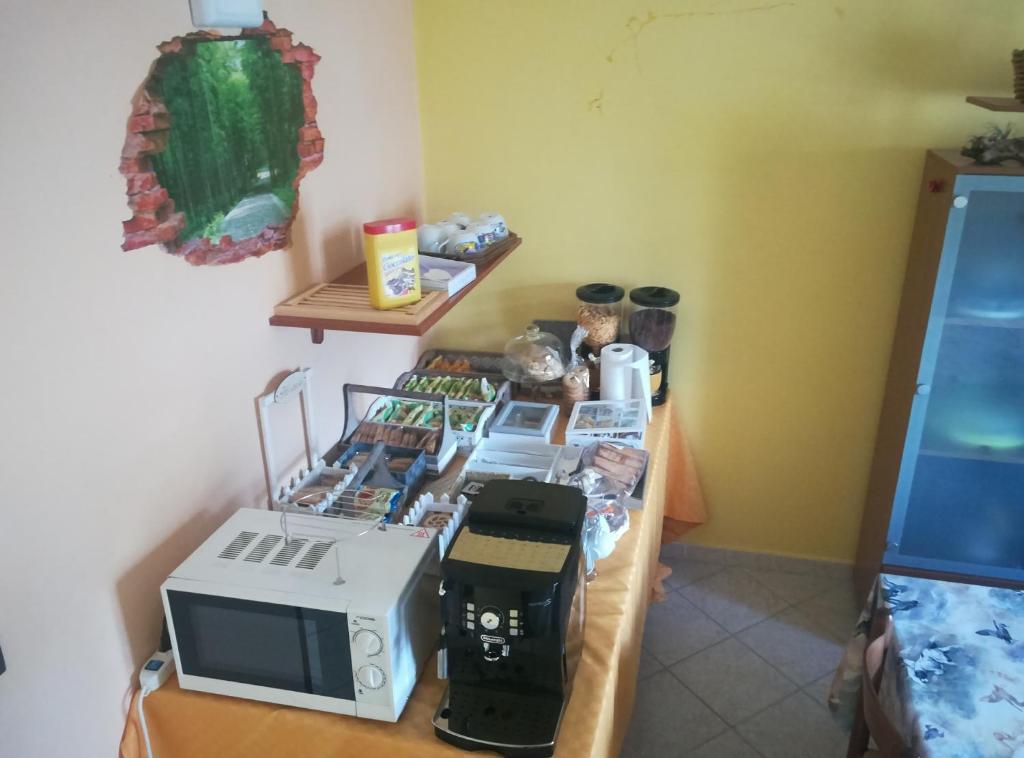 Kuchyň nebo kuchyňský kout v ubytování Complesso turistico Aurora - camere B&B