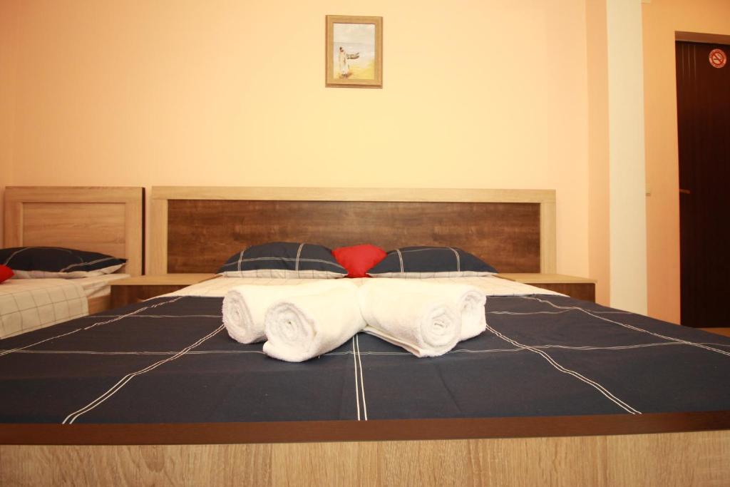 Postel nebo postele na pokoji v ubytování GALA Hotel Ureki