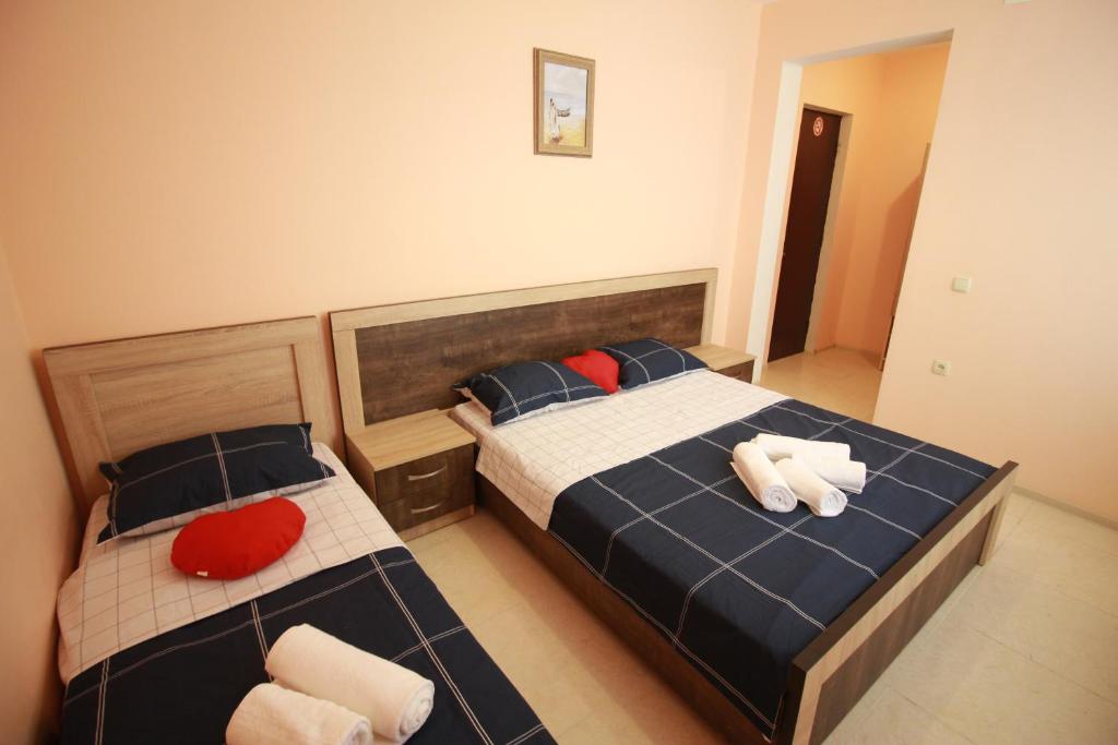 Postel nebo postele na pokoji v ubytování GALA Hotel Ureki