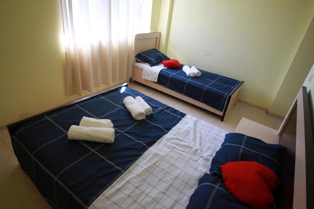 Postel nebo postele na pokoji v ubytování GALA Hotel Ureki