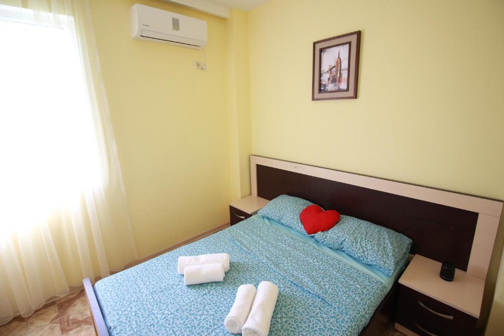 Postel nebo postele na pokoji v ubytování GALA Hotel Ureki