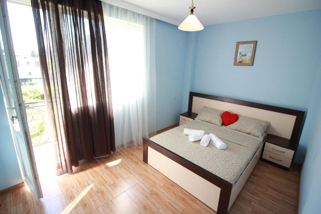 Postel nebo postele na pokoji v ubytování GALA Hotel Ureki