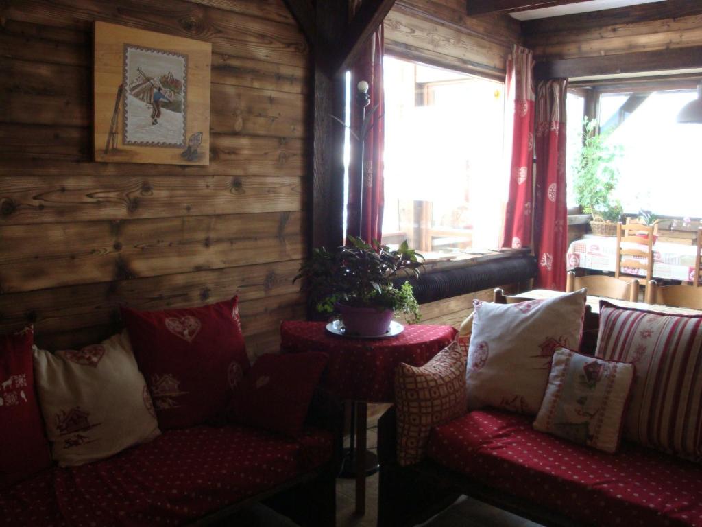 Posezení v ubytování Chambres d'Hôtes Chalet de la Source