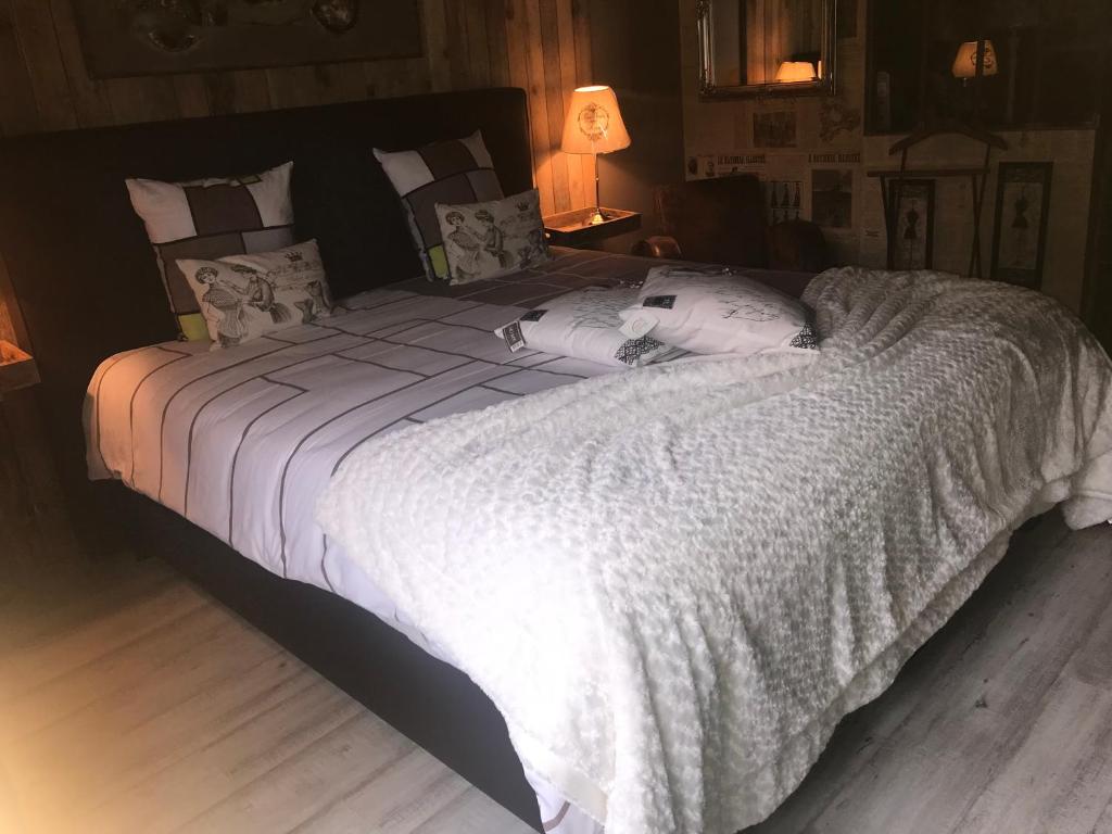 Postel nebo postele na pokoji v ubytování Le Relais de Chassepierre