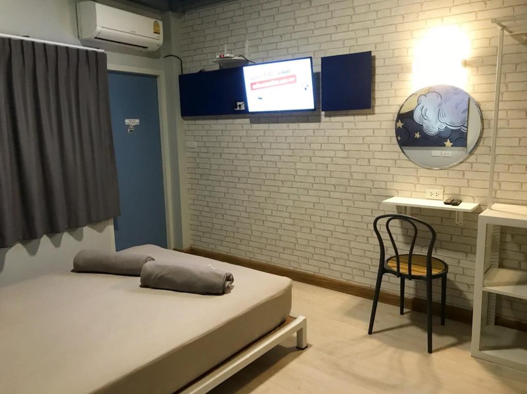 Voodi või voodid majutusasutuse The Moon Hostel Huahin toas