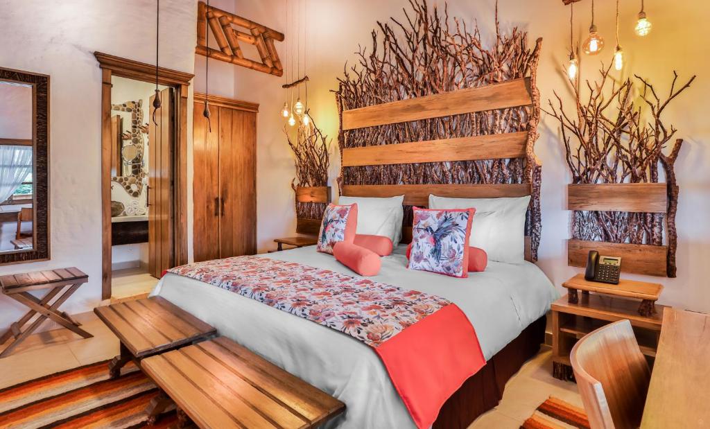 Postel nebo postele na pokoji v ubytování Hotel Casa San Carlos Lodge Pereira
