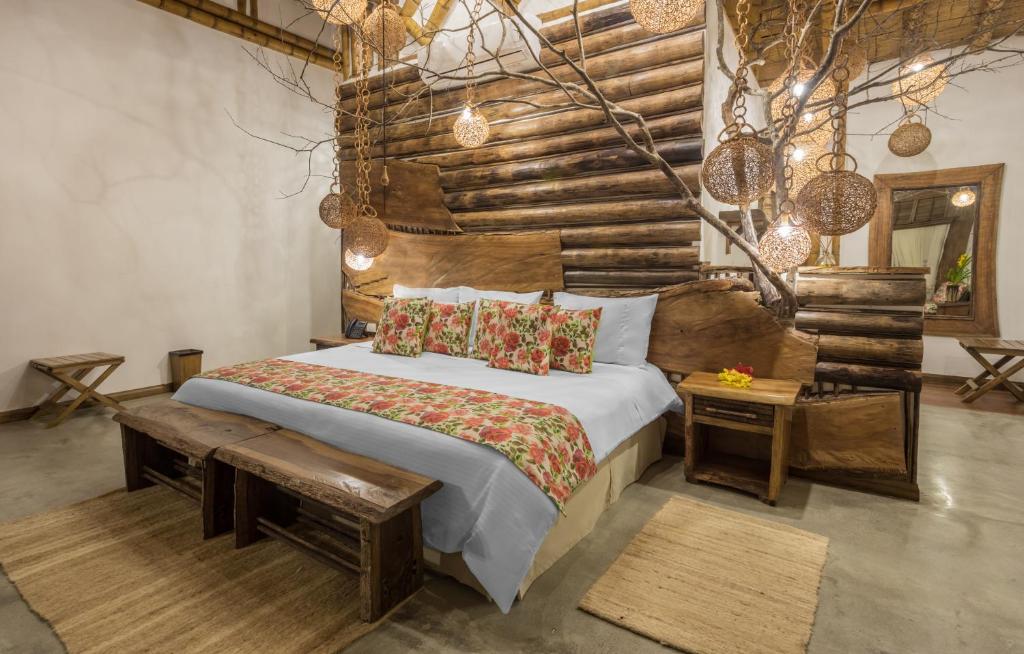 Postel nebo postele na pokoji v ubytování Hotel Casa San Carlos Lodge Pereira