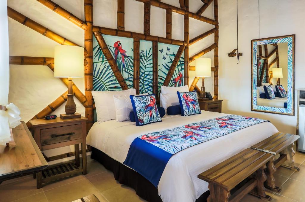 Postel nebo postele na pokoji v ubytování Hotel Casa San Carlos Lodge Pereira