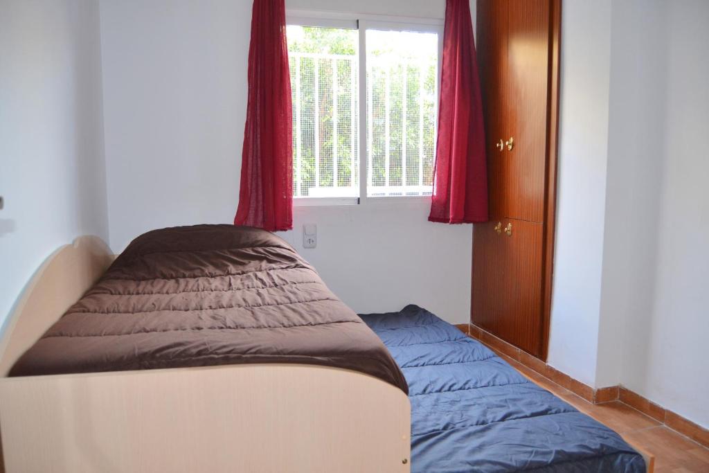 Posteľ alebo postele v izbe v ubytovaní Apartamento Palomas