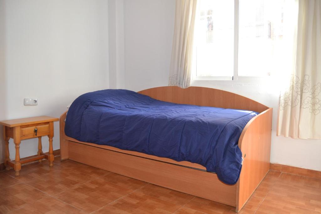 Posteľ alebo postele v izbe v ubytovaní Apartamento Palomas