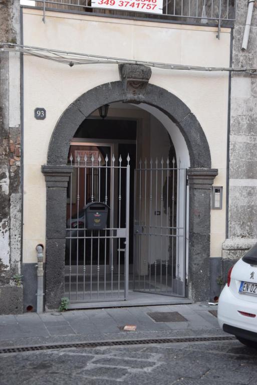 an entrance to a building with a gate at Riposto Etna Taormina Mare in Riposto