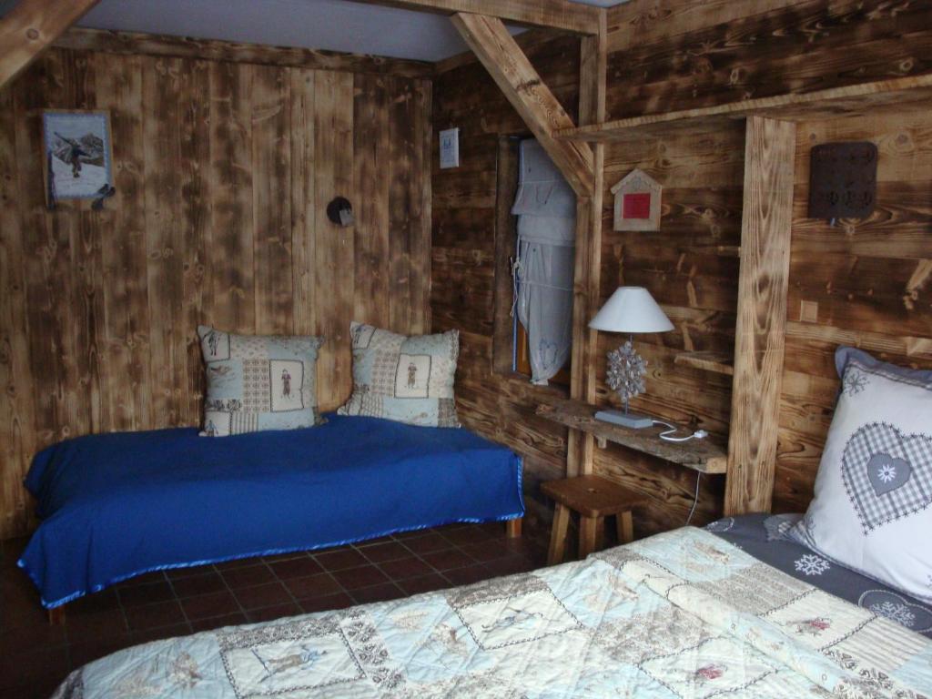 Postel nebo postele na pokoji v ubytování Chambres d'Hôtes Chalet de la Source