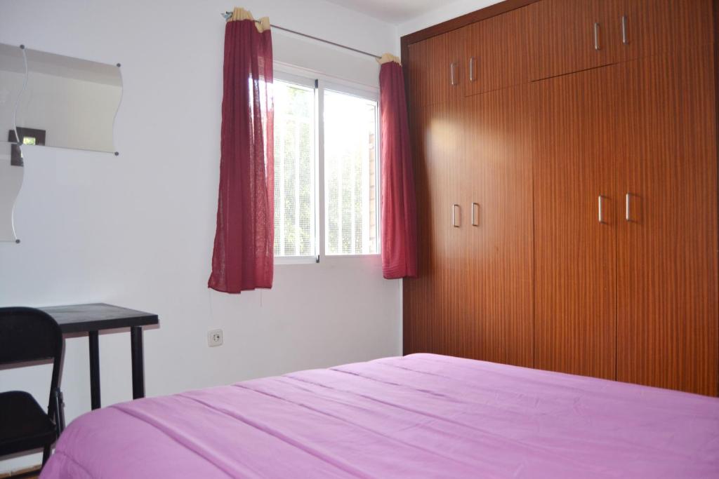 Posteľ alebo postele v izbe v ubytovaní Apartamento Palomas