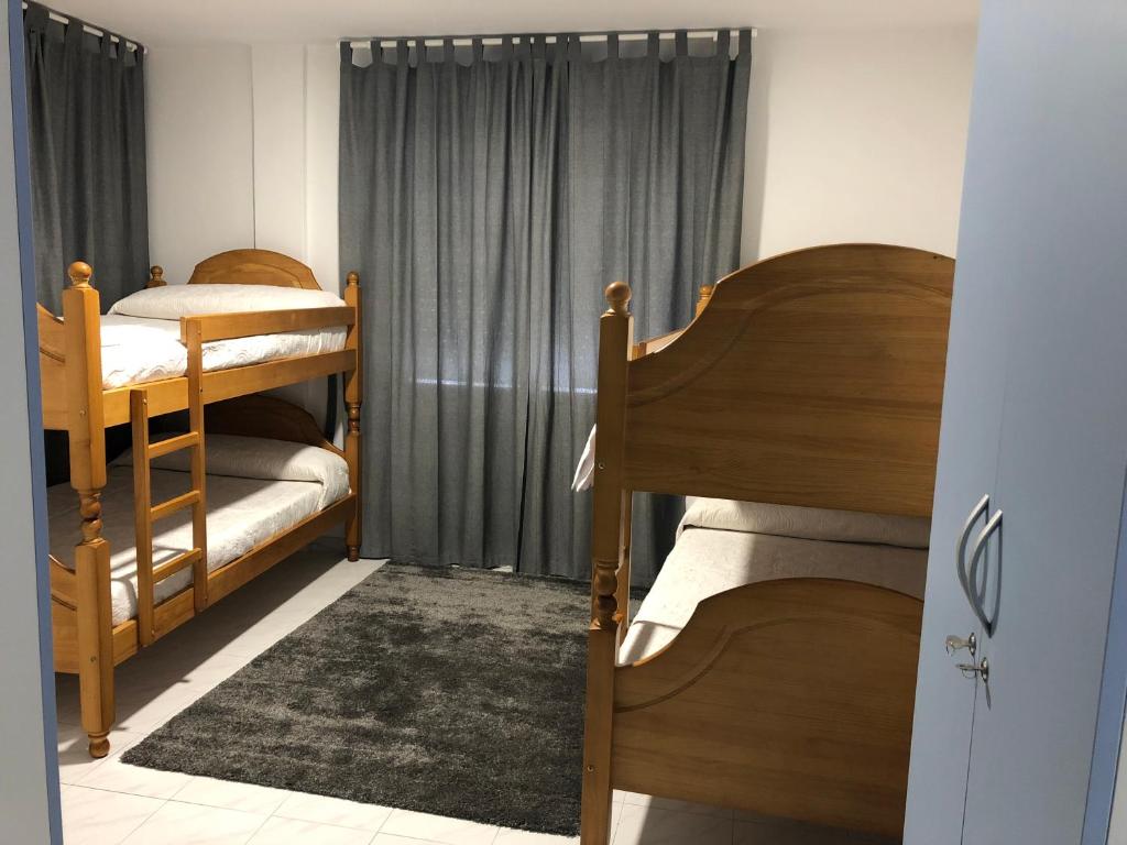 Postel nebo postele na pokoji v ubytování A Senda
