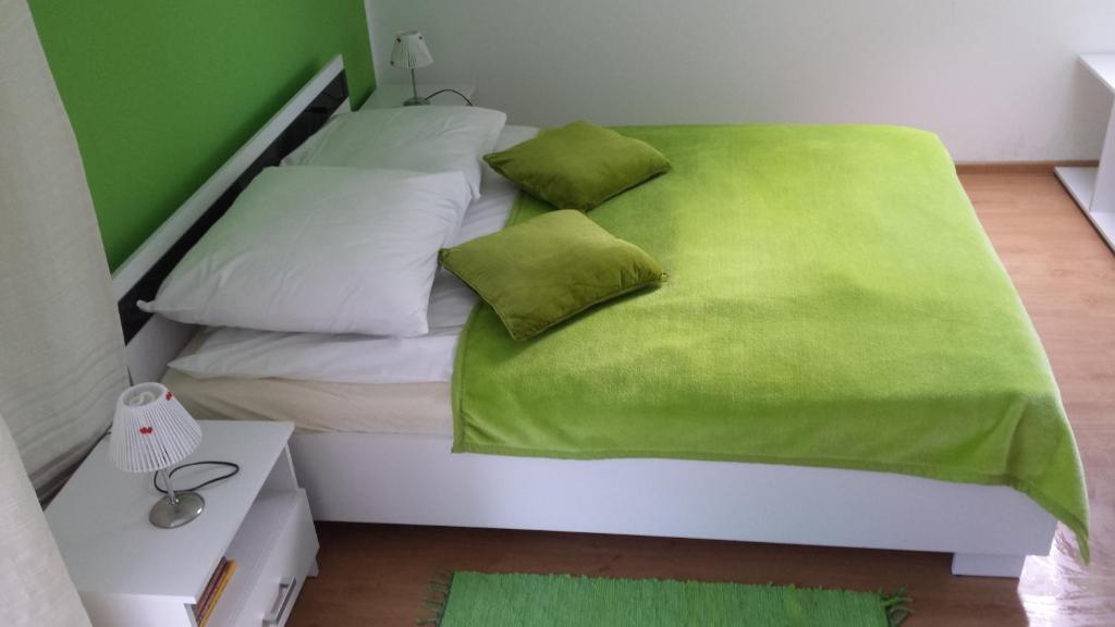 Posteľ alebo postele v izbe v ubytovaní POKOJE GOŚCINNE RENATA KNITTER
