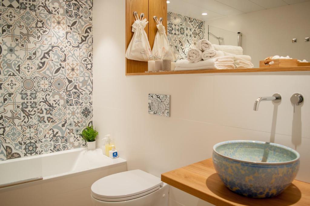 Koupelna v ubytování Apartamentos Porta Coeli