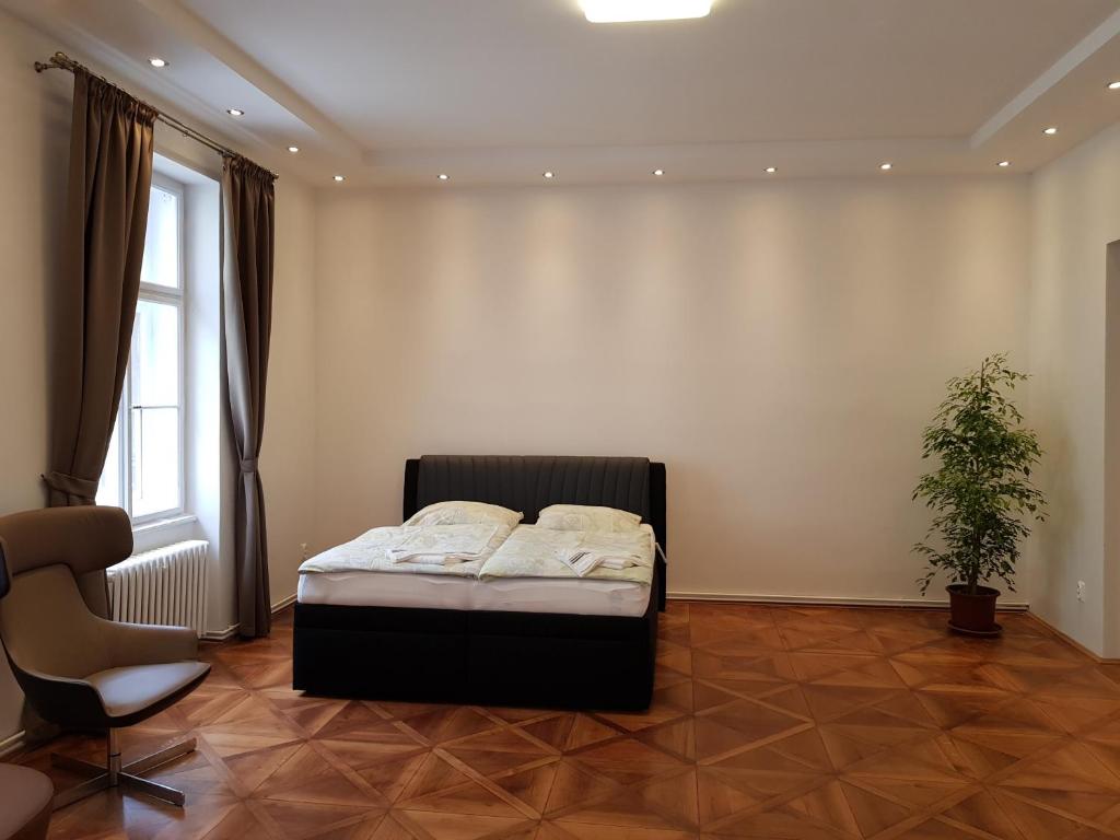 Postel nebo postele na pokoji v ubytování Prague Centre Apartments