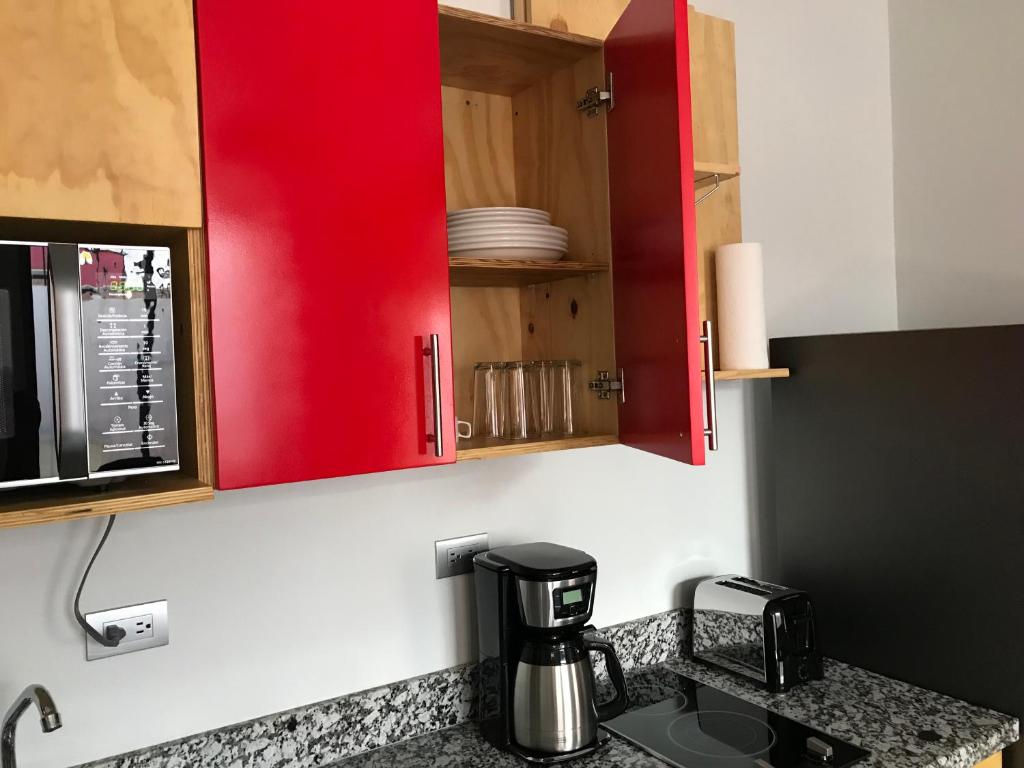 Kuchyň nebo kuchyňský kout v ubytování Apartamentos Equipados RyA del Volcán