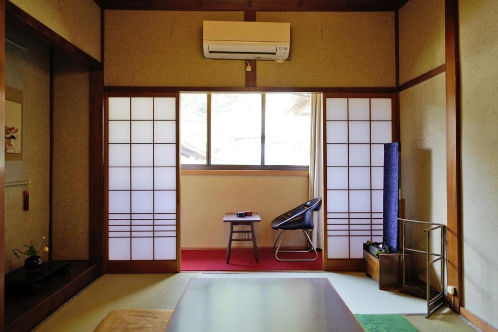 Posezení v ubytování Japanese Guesthouse Kinosaki Wakayo (Female Only)