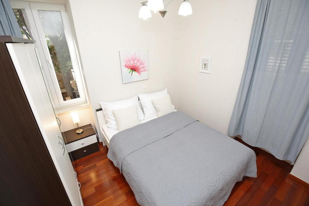 Posteľ alebo postele v izbe v ubytovaní SeaFront Beach Apartment - DIRECTLY AT THE BEACH