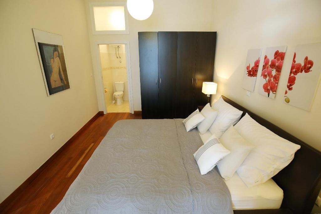 Posteľ alebo postele v izbe v ubytovaní SeaFront Beach Apartment - DIRECTLY AT THE BEACH