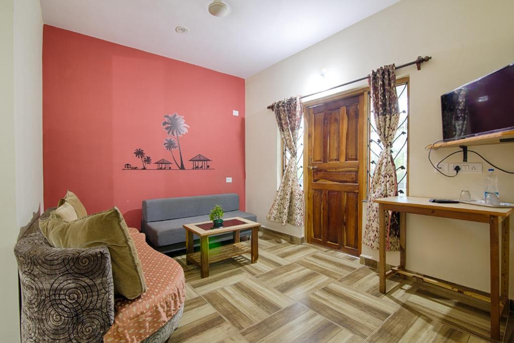 TV a/nebo společenská místnost v ubytování Palm Shades Spring