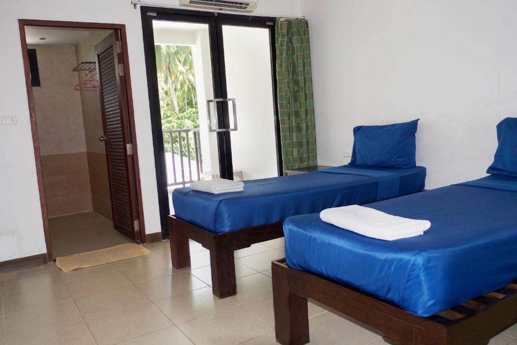 Cama o camas de una habitación en Superpro Samui