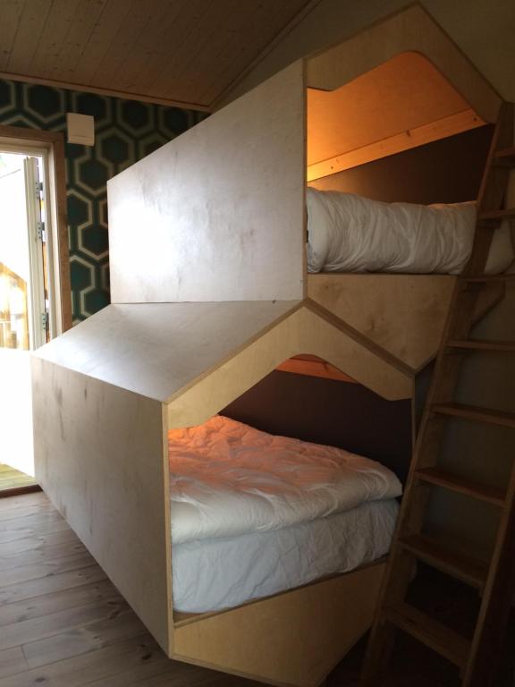 Postel nebo postele na pokoji v ubytování Bikupan
