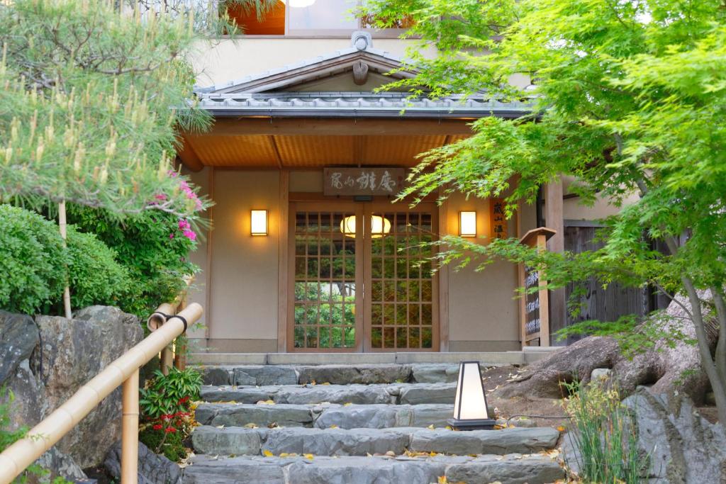 a cone is sitting in front of a building at Arashiyama Benkei in Kyoto